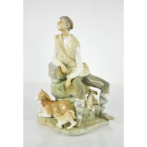 109 - A Lladro porcelain figure group titled Shepherd Resting, number 4571, 26cm high.