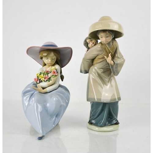 119 - Two Lladro figurines, one titled Fragrant Bouquet and signed Lladro to the base and dated 23.5.93, t... 