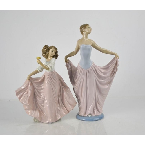 122 - Two Lladro figurines, one Dancer numbered 5050, with box, and a girl dancing with flowers, 6543, 23c... 