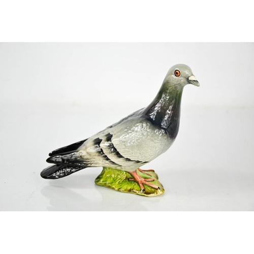 149 - A large Beswick pigeon, numbered 1383 to the base, 14cm high.