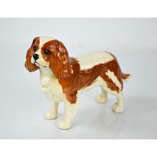 152 - A Beswick King Charles Spaniel, 13cm high.