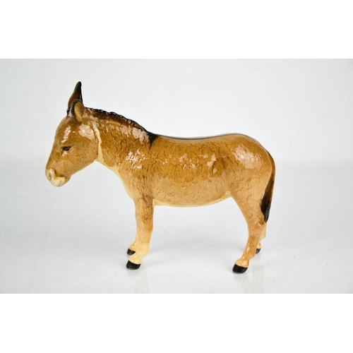 157 - A Beswick donkey, 13cm high.