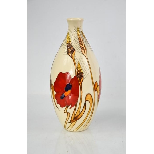 26 - A Moorcroft vase, Poppy & Wheat design, signed and dated 2009, 24cm high.