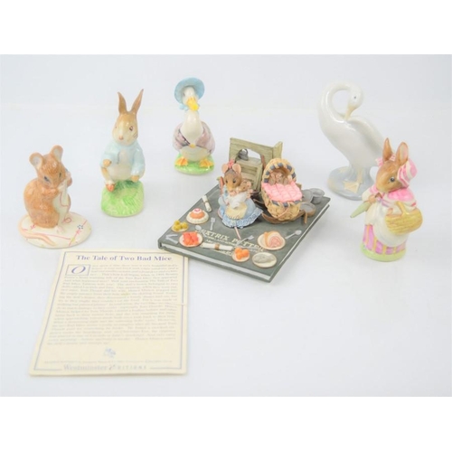 270 - A group of Beswick and Royal Albert Beatrix potter characters to include Peter Rabbit and Mrs Rabbit