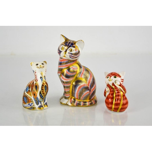 41 - Three Royal Crown Derby cats, LXII, LVIII, and MMII and Playful Ginger Kitten by Hugh Gibson, signed... 