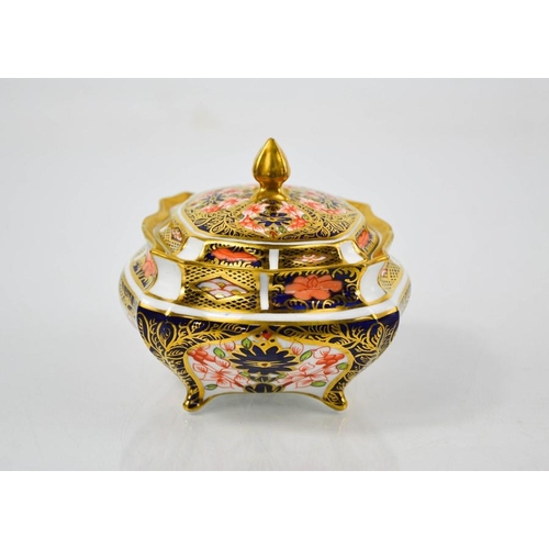 56 - A Royal Crown Derby Old Imari pattern 2451 pattern box and lid, 10cm by 8.5cm.