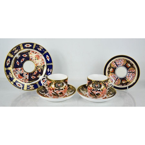 61 - A pair of Royal Crown Derby cups and saucers and dish, together with a Paragon Imari pattern plate, ... 