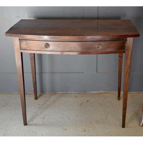 669 - A 19th century mahogany bow fronted side table, tapered legs, 81cm high by 94.5cm