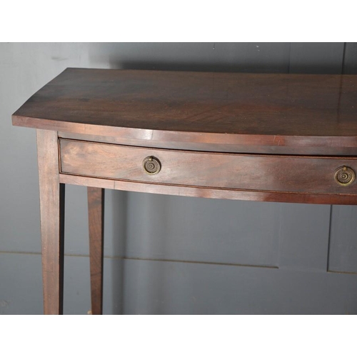 669 - A 19th century mahogany bow fronted side table, tapered legs, 81cm high by 94.5cm