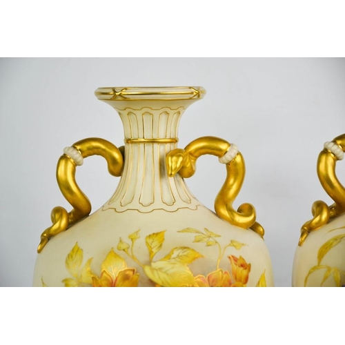 1 - A pair of Royal Worcester vases, finely painted with flowers on a peach and ivory ground, with twin ... 