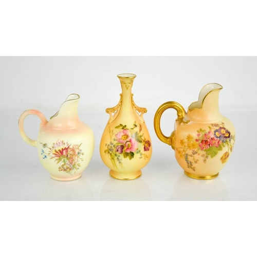 13 - Three Royal Worcester miniature blush ivory examples, including two flat back jugs and a twin handle... 