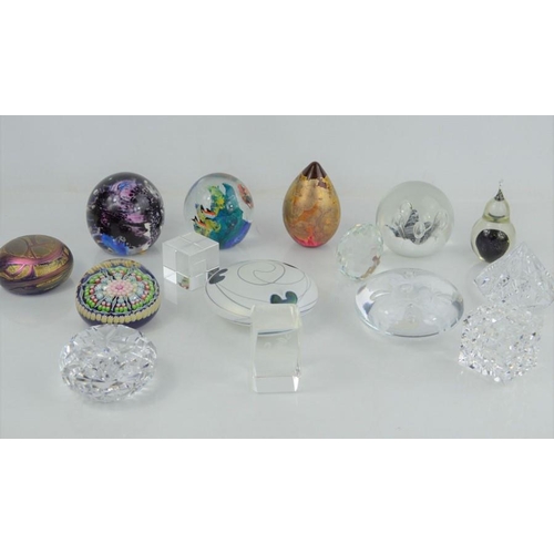 143 - A group of collectible glass paperweights to include Pfeiffer, Caithness, Uredale, Lakeland etc