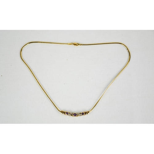 173 - A 9ct gold and amethyst necklace, 6.85g.