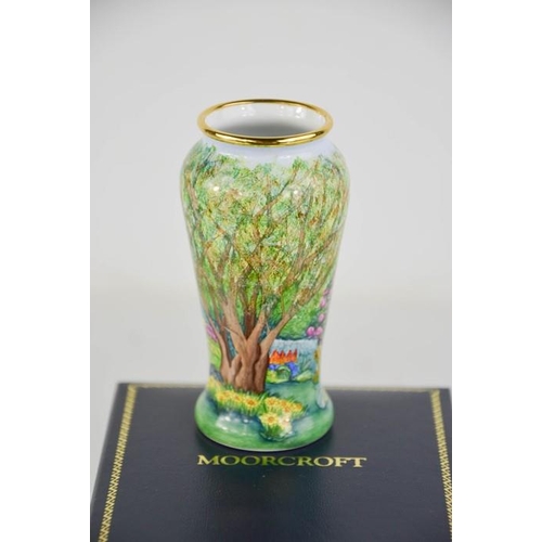 24 - A Moorcroft enamelled miniature vase, Eve's Garden, limited edition 70/100, initialled to the base W... 