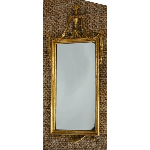 482 - An antique French gilded mirror, 47cms x 110cms