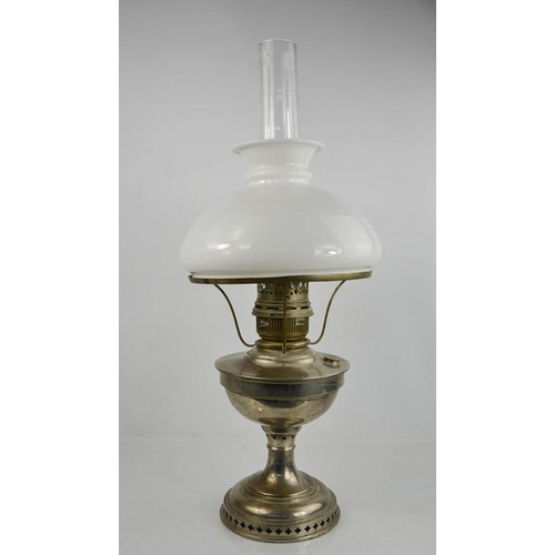 484 - A steel paraffin lamp with white glass shade.