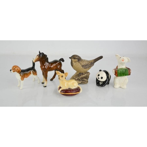 78 - A group of Beswick animal figures to include foal, bird, panda cub, dog and chihuahua.