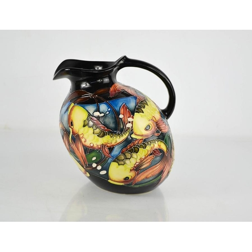 80 - A Moorcroft Jug titled Fishing Around, a limited edition example, No 40/75 produced and designed by ... 