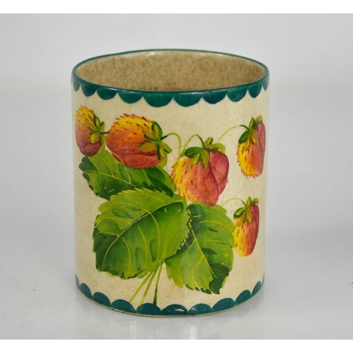 94 - A Wemyss pottery mug, painted with strawberries and signed to the base, 9cm high.