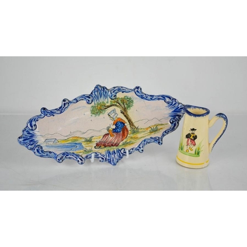 98 - A French Quimper pottery dish and similar milk jug.