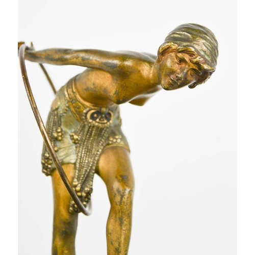 10 - Dimitri Chiparus (1886-1947): a bronze Art Deco dancer with hoop, raised above a marble potpourri di... 