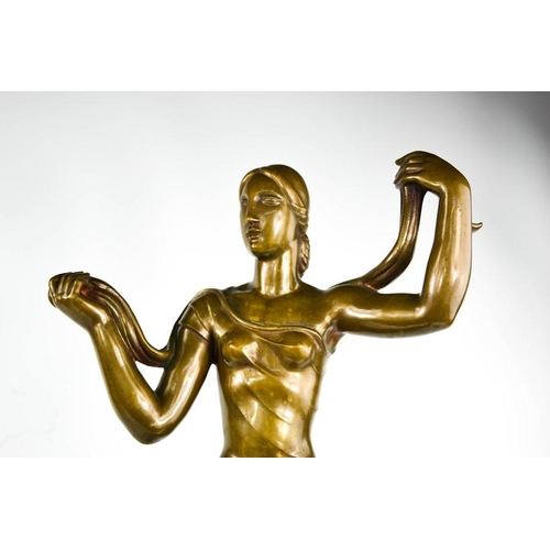 12 - Jaroslaw Horecj (1886-1983): Art deco bronze figure raised on a red marble base, signed beneath the ... 