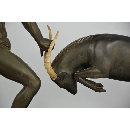 13 - Kowas (20th century): an Art Deco Spelter figure group titled Antelope Hunter, etched to the slate b... 