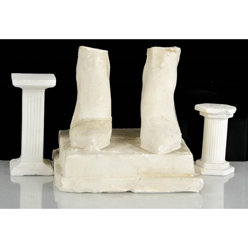 19 - Eduardo Paolozzi (1924-2005): two plaster columns and a pair of feet A/F. Feet 12cms tall to include... 