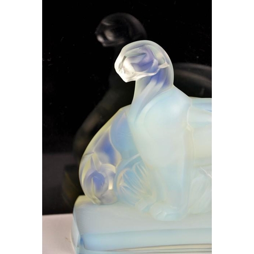 23 - A Sabino Art glass opalescent panther group. 15.5cms tall