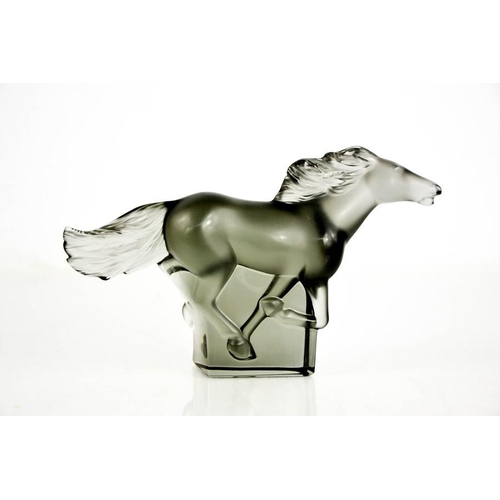 32 - A Rene Lalique Kazak smoky glass horse, etched Lalique, in original box.11.5cms x 18cms