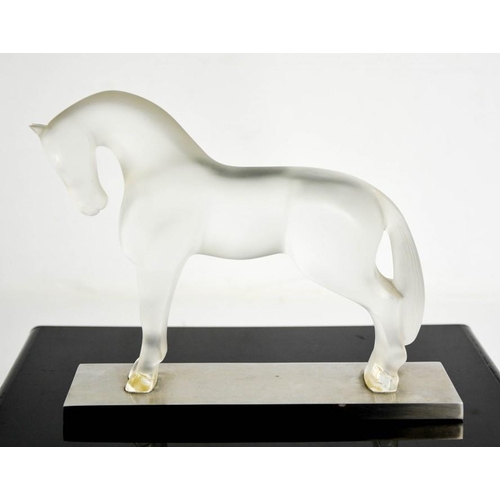 33 - A Lalique opaque glass horse on metal base, signed to the back feet Lalique, France, bearing label t... 