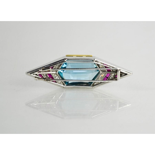 42 - An Art Deco 18ct yellow gold, platinum, ruby, diamond and aquamarine brooch, the hexagonal cut aquam... 