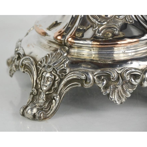 116 - An impressive 19th century silver plated centrepiece with four scrollwork removable branches raising... 