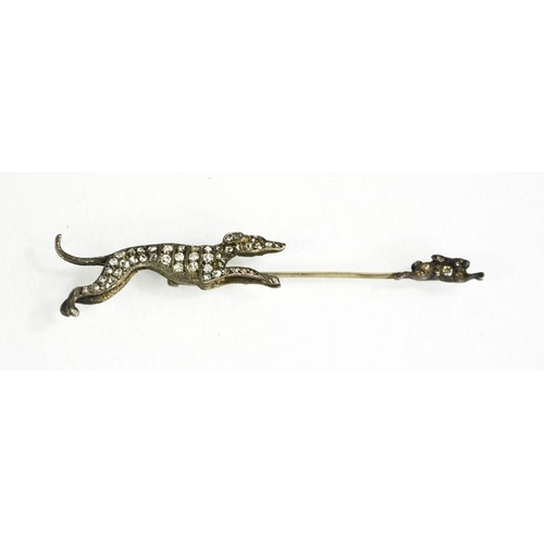 167 - A silver and paste set tie pin, greyhound chasing a hare, 8cm long.