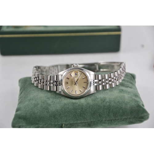 210 - A Rolex Oyster Perpetual ladies stainless steel wristwatch, together with original leather wallet wi... 