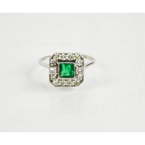 220 - An 18ct white gold Art Deco style emerald and diamond ring, J½, 2.7g.