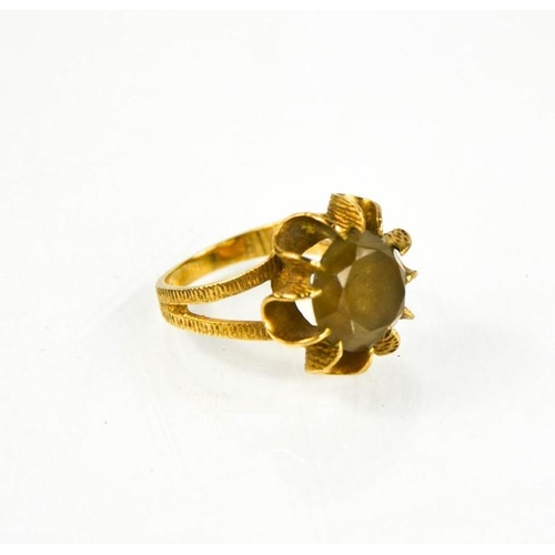 232 - A 9ct gold and citrine flowerhead ring, size O/P, 5.4g.