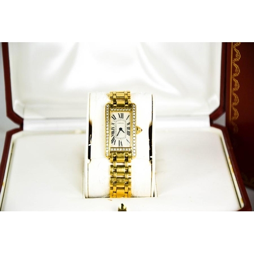 253 - An 18ct gold and diamond Cartier wristwatch, in the Tank Americaine design, silver grained dial read... 