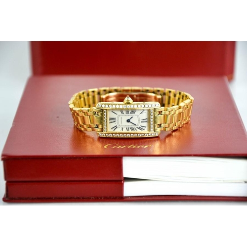 253 - An 18ct gold and diamond Cartier wristwatch, in the Tank Americaine design, silver grained dial read... 