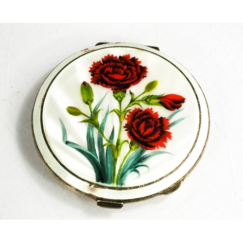 268 - A silver and guilloche enamel compact, painted with red roses, mirrored interior, 3.1toz total.