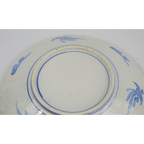 274 - A 19th century Chinese blue and white charger with scalloped edge depicting figural scenes together ... 