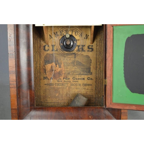 473 - A 19th century American wall clock with painted glass panel, thirty hour, together with an Edwardian... 
