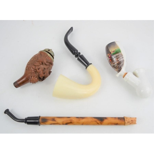 502 - A  Salzburg Tiroler carved smoking pipe bowl, ceramic Berta’s Errettung pipe and other items