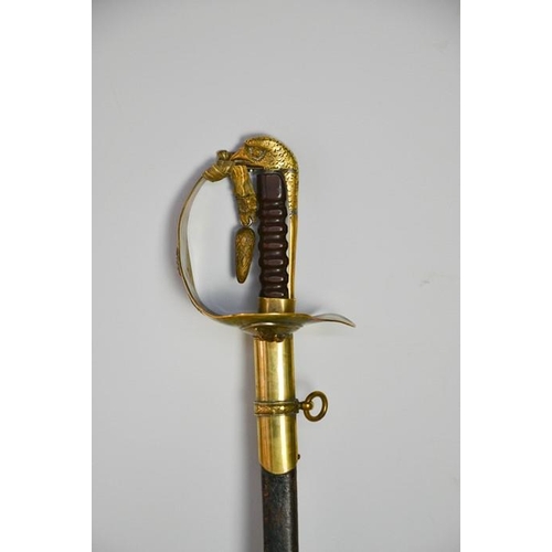 508 - An RAF dress sword with brass hilt, complete with dust sheet, and leather scabbard, with applied RAF... 