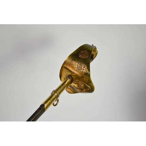 508 - An RAF dress sword with brass hilt, complete with dust sheet, and leather scabbard, with applied RAF... 
