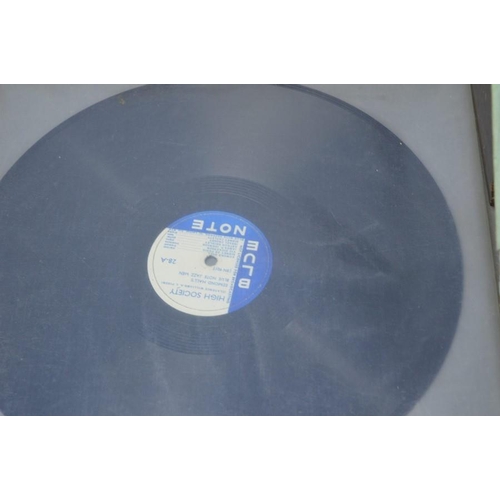 531 - A HMV model 2128A  electric gramophone together with a quantity of 78