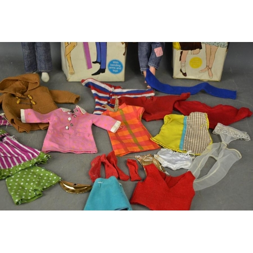 534 - A vintage Patch and Paul, with original boxes and a group of clothing with some Sindy examples.