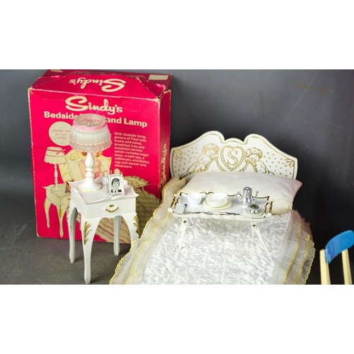 535 - A group of vintage Sindy examples, to include wardrobe, bedside table and lamp (with original box), ... 