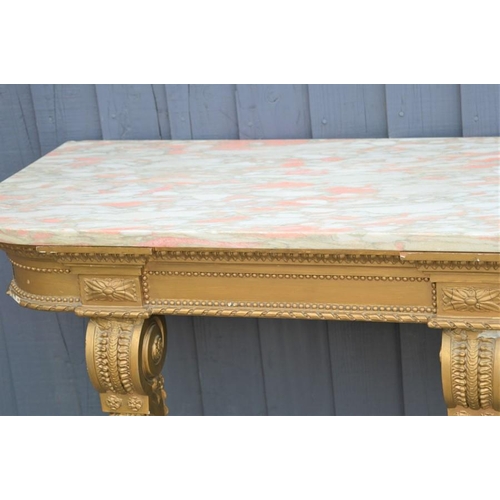 577 - A pair of Louis XVI style giltwood and marble top console tables with twin turned, carved and taperi... 