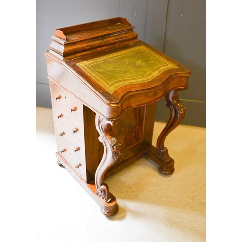 615 - A Victorian walnut davenport with green leather writing slope with inlaid cupboard and stationary co... 